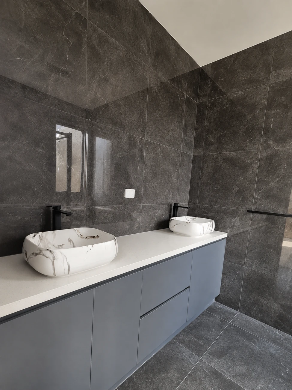 Bathroom vanity joinery with stone basins
